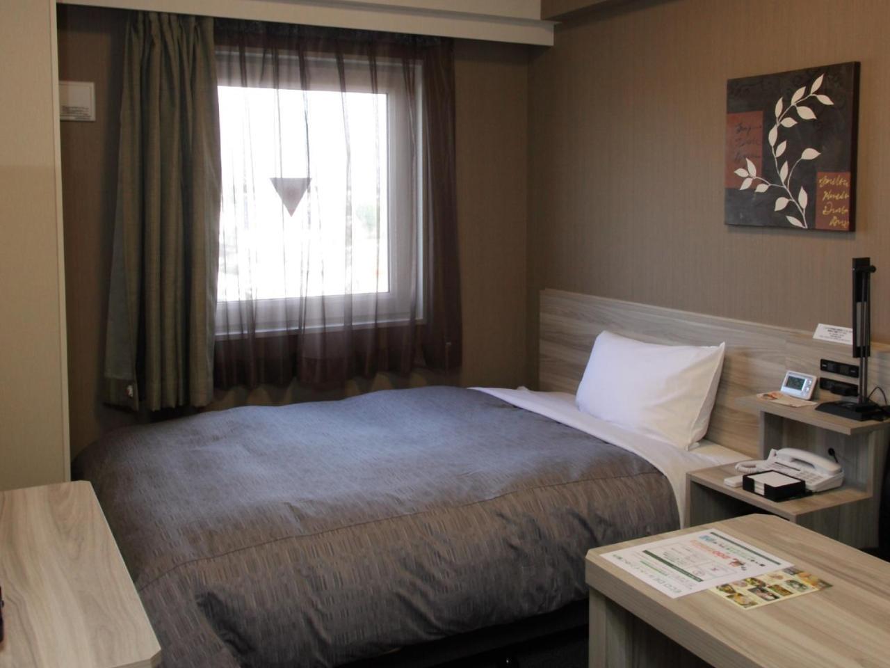 Hotel Route-Inn Ishioka Bagian luar foto